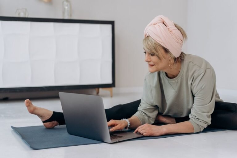 Person looking at a class schedule board in a yoga studio