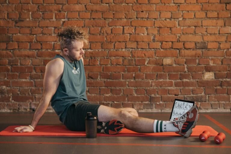 A person doing a light bodyweight workout at home after time away from training