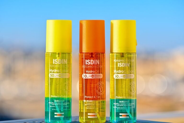 Two sunscreen bottles, one labeled mineral and one chemical, standing side by side on a bathroom counter